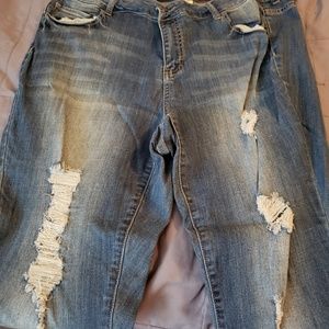 Distressed blue jeans